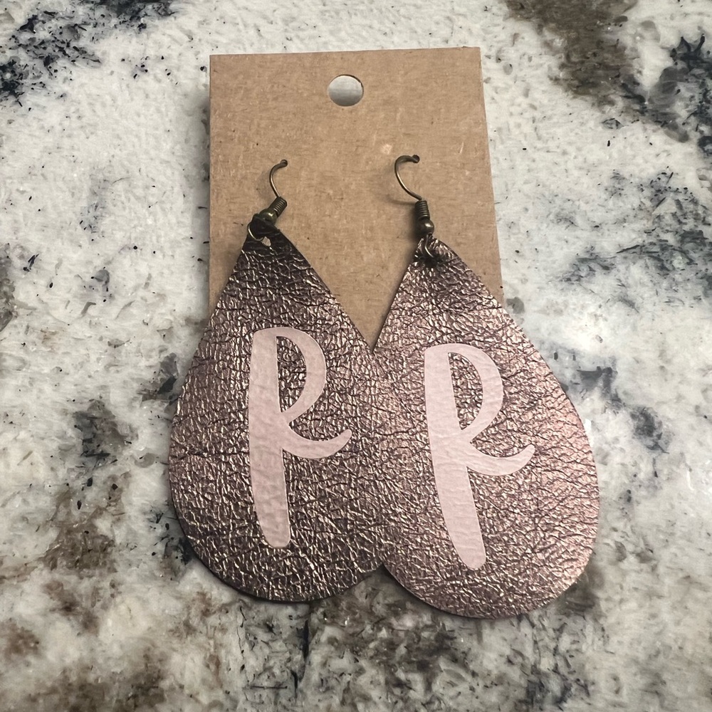 Rose gold “R” earrings